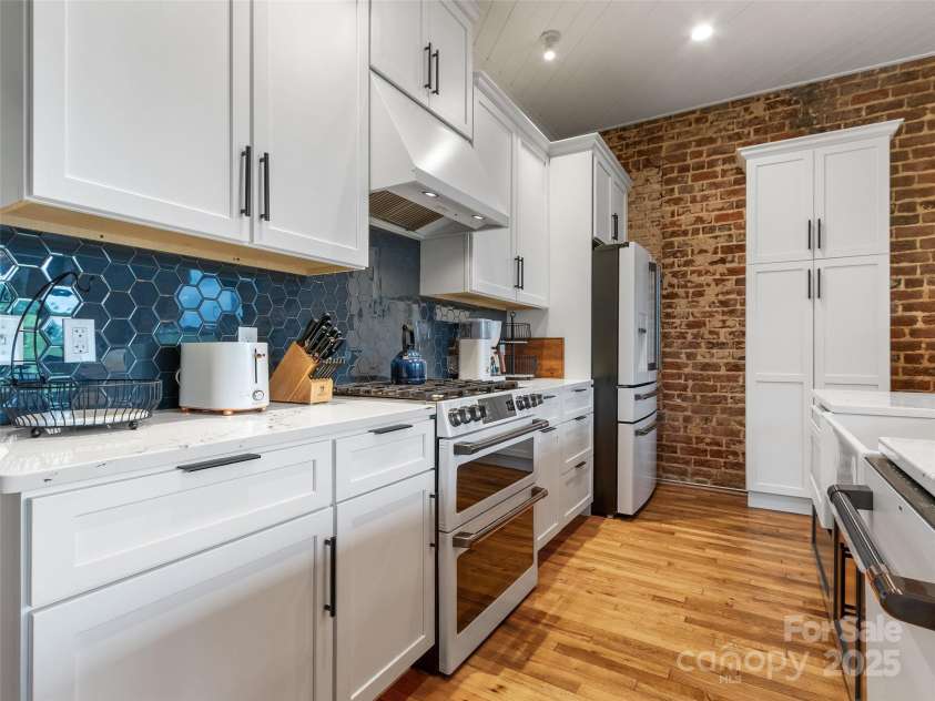 5 Town Square, Burnsville, NC 28714.  MLS# CAR4284216, YatesRealty ID 20869. Kitchen with GE Cafe Appliances