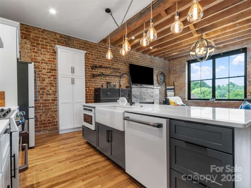 5 Town Square, Burnsville, NC 28714.  MLS# CAR4284216, YatesRealty ID 20869. Kitchen with GE Cafe Appliances