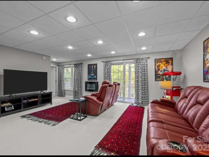 42 Surrey Run, Asheville, NC 28803.  MLS# CAR4285400, YatesRealty ID 2087. Basement family room