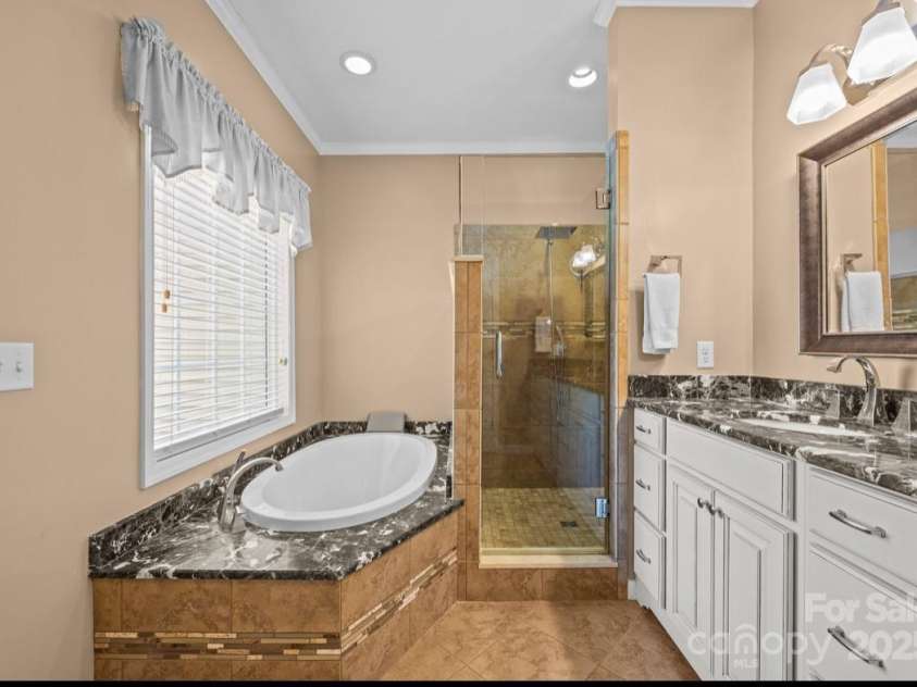 42 Surrey Run, Asheville, NC 28803.  MLS# CAR4285400, YatesRealty ID 2087. Primary en suite bathroom