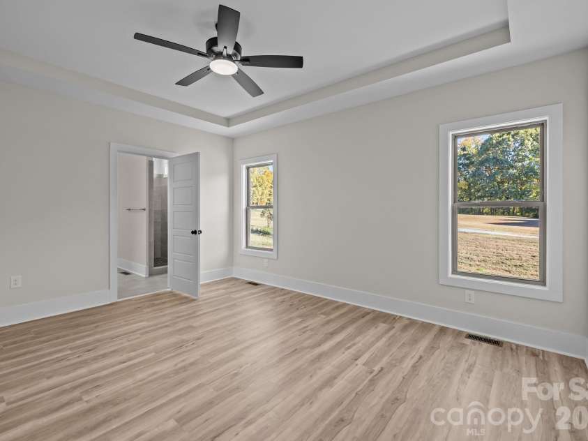 2003 Duntov Drive, Monroe, NC 28110.  MLS# CAR4405457, YatesRealty ID 20871. Primary Bedroom