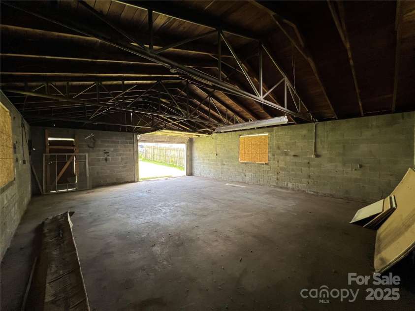 304 Ingram Street, Thomasville, NC 27360.  MLS# CAR4271993, YatesRealty ID 20872. Inside of Storage Shed