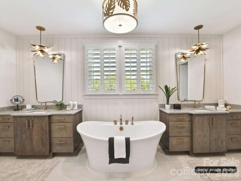 3133 Country Club Drive, Charlotte, NC 28205.  MLS# CAR4370769, YatesRealty ID 20874. Free Standing Tub with dual vanities 