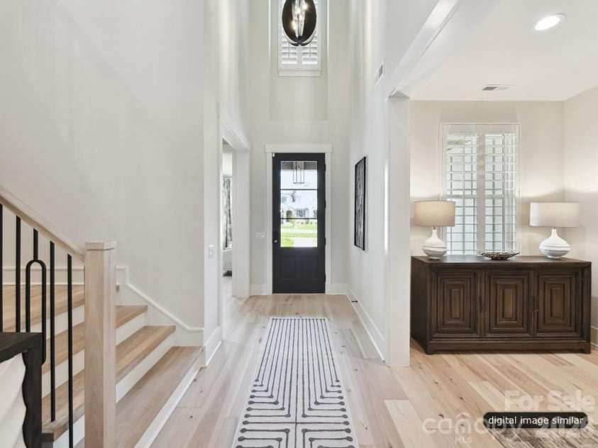3133 Country Club Drive, Charlotte, NC 28205.  MLS# CAR4370769, YatesRealty ID 20874. The foyer flows into the heart of the home
