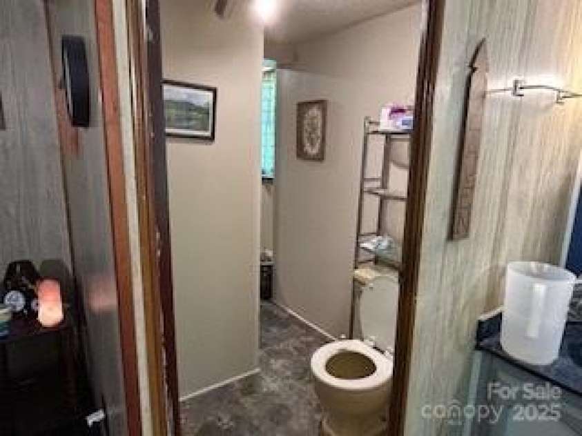 40 Robinson Holler Drive, Marion, NC 28752.  MLS# CAR4273605, YatesRealty ID 20880. Bathroom with standup shower