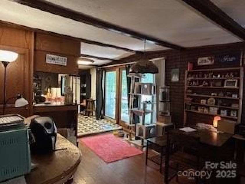 40 Robinson Holler Drive, Marion, NC 28752.  MLS# CAR4273605, YatesRealty ID 20880. Dining room looking into kitchen