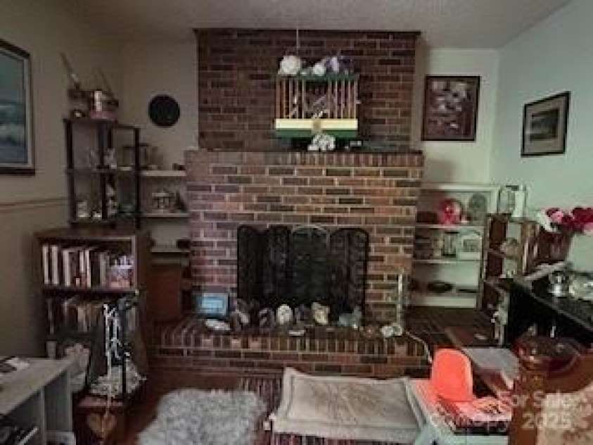 40 Robinson Holler Drive, Marion, NC 28752.  MLS# CAR4273605, YatesRealty ID 20880. FP in living room