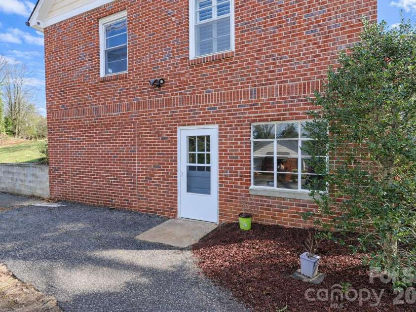 216 31st Avenue, Hickory, NC 28601.  MLS# CAR4349538, YatesRealty ID 20884. Basement access from the lower driveway