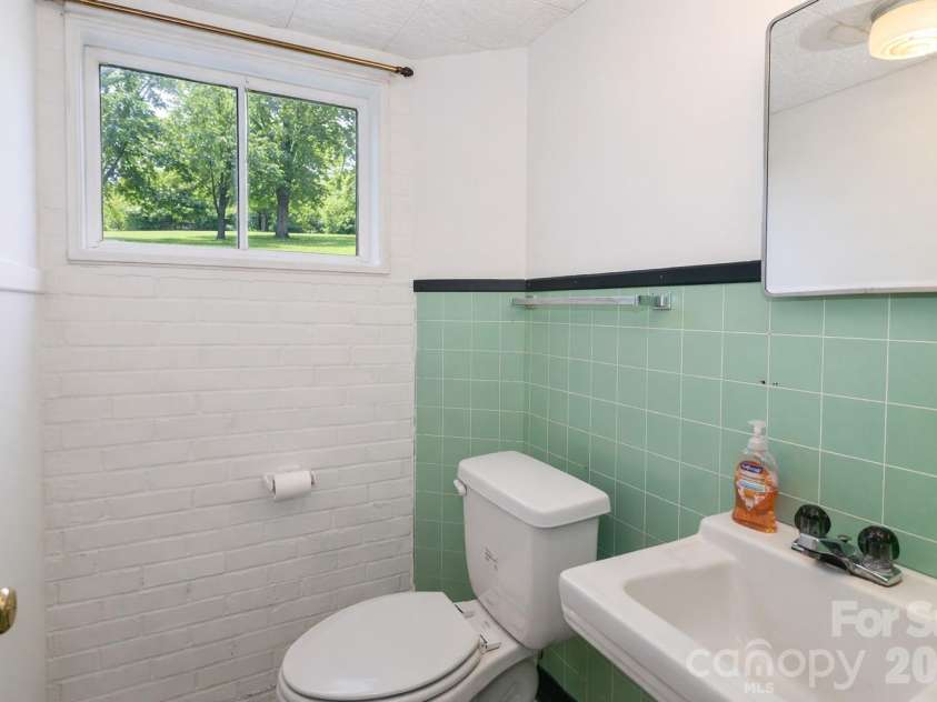 216 31st Avenue, Hickory, NC 28601.  MLS# CAR4349538, YatesRealty ID 20884. Basement half bathroom