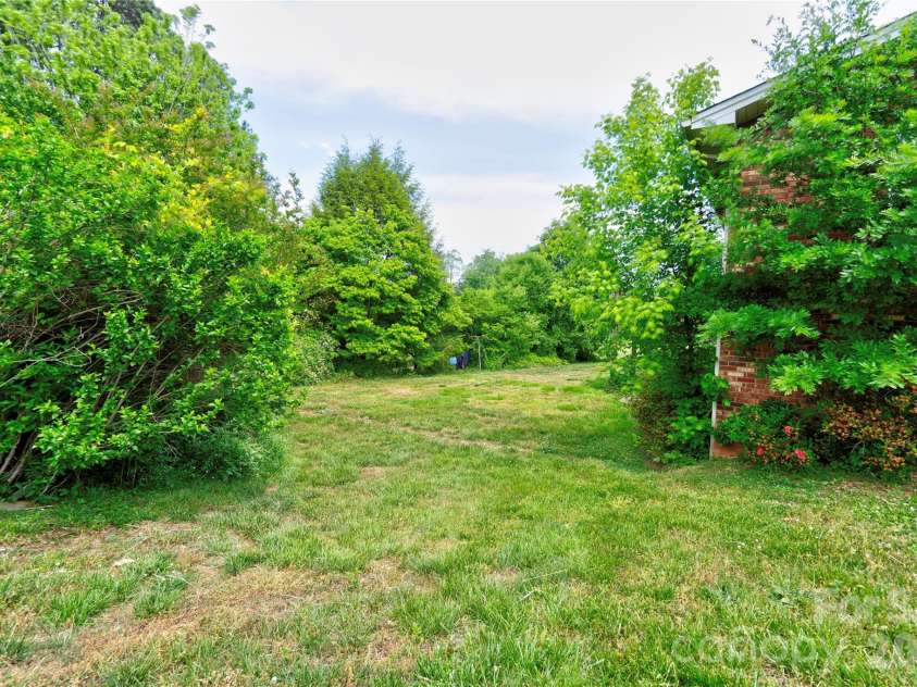 130 Old Belwood Road, Lawndale, NC 28090.  MLS# CAR4378448, YatesRealty ID 20885. Back Yard