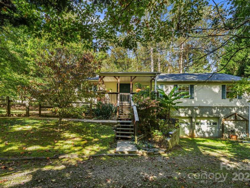 35 Evelyn Acres Drive, Asheville, NC 28806.  MLS# CAR4312401, YatesRealty ID 20886. Flowering trees and shrubs greet you as you pull into the drive and put on a show from season to season!