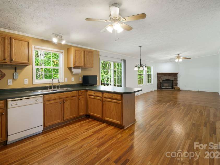 35 Evelyn Acres Drive, Asheville, NC 28806.  MLS# CAR4312401, YatesRealty ID 20886. Open concept allows for counter seating and dining table seating.