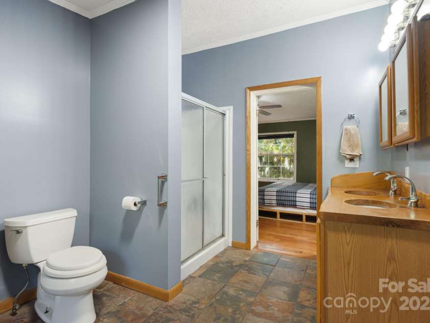 35 Evelyn Acres Drive, Asheville, NC 28806.  MLS# CAR4312401, YatesRealty ID 20886. Primary bathroom