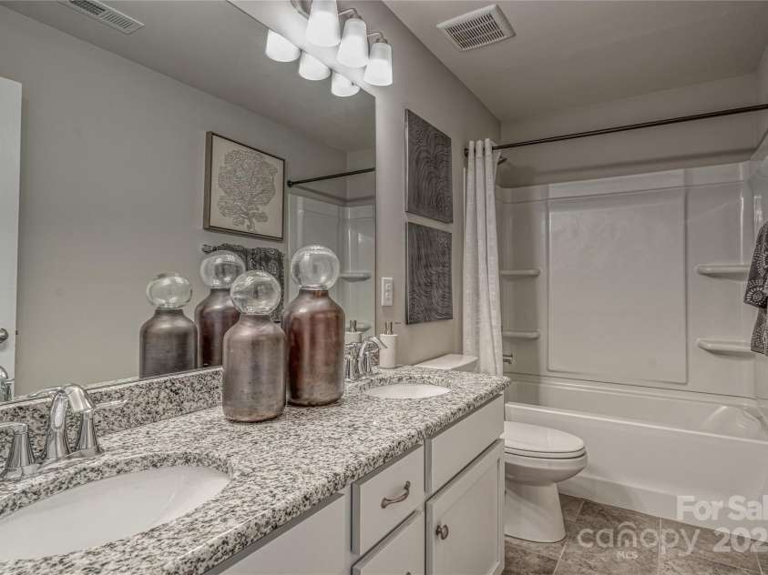 247 Tackle Box Drive, Troutman, NC 28166.  MLS# CAR4250227, YatesRealty ID 20892. Guest Bath