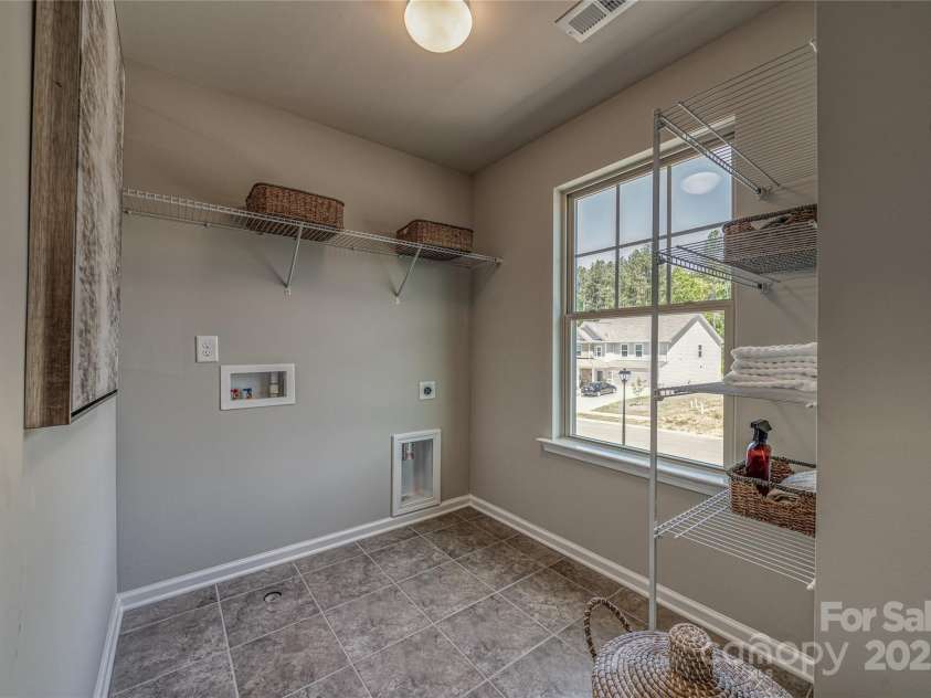 247 Tackle Box Drive, Troutman, NC 28166.  MLS# CAR4250227, YatesRealty ID 20892. Laundry Room on second floor