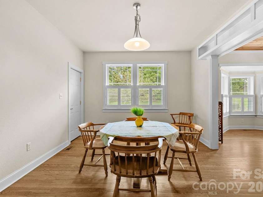 11 Myra Place, Asheville, NC 28806.  MLS# CAR4284280, YatesRealty ID 20895. Dining area- is generous in size and can handle a larger table.