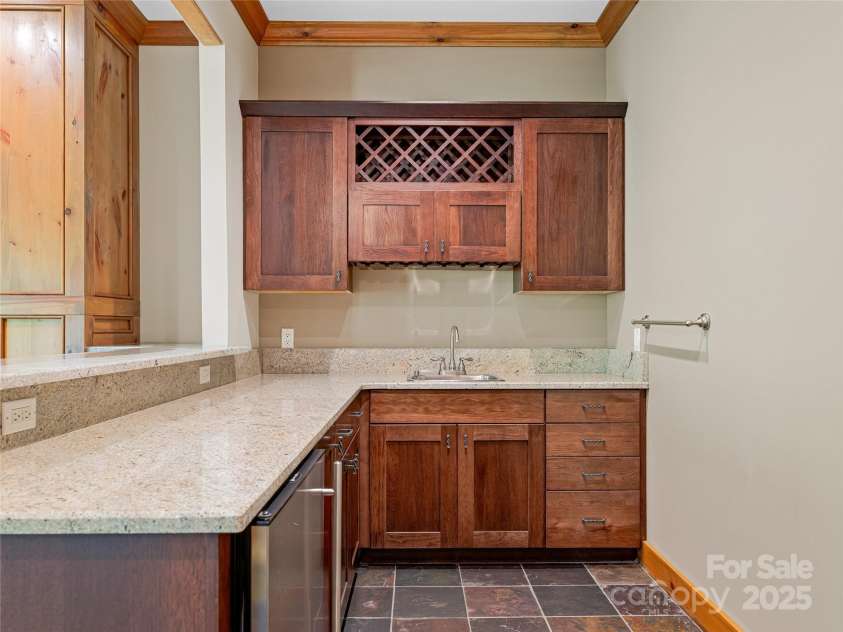 14 Sweet Gum Hill, Fletcher, NC 28732.  MLS# CAR4249700, YatesRealty ID 20898. Lower Level Wet Bar