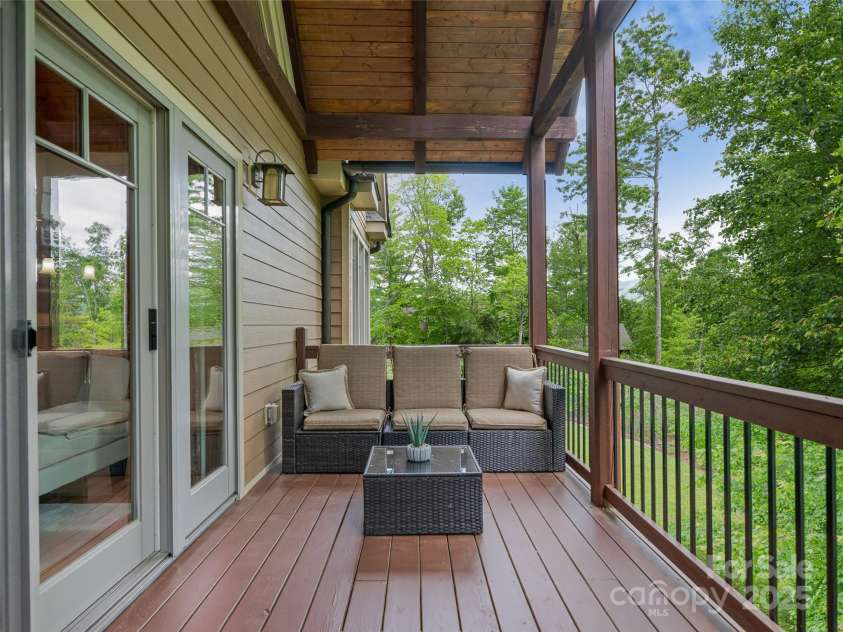 14 Sweet Gum Hill, Fletcher, NC 28732.  MLS# CAR4249700, YatesRealty ID 20898. Upper level deck off great room.
