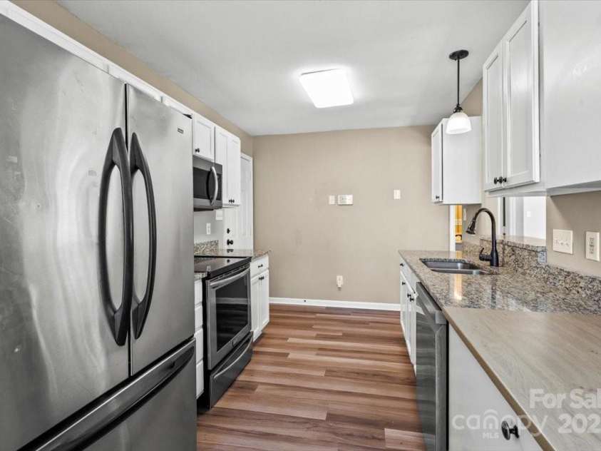8610 Sawleaf Court, Charlotte, NC 28215.  MLS# CAR4257465, YatesRealty ID 20899. 