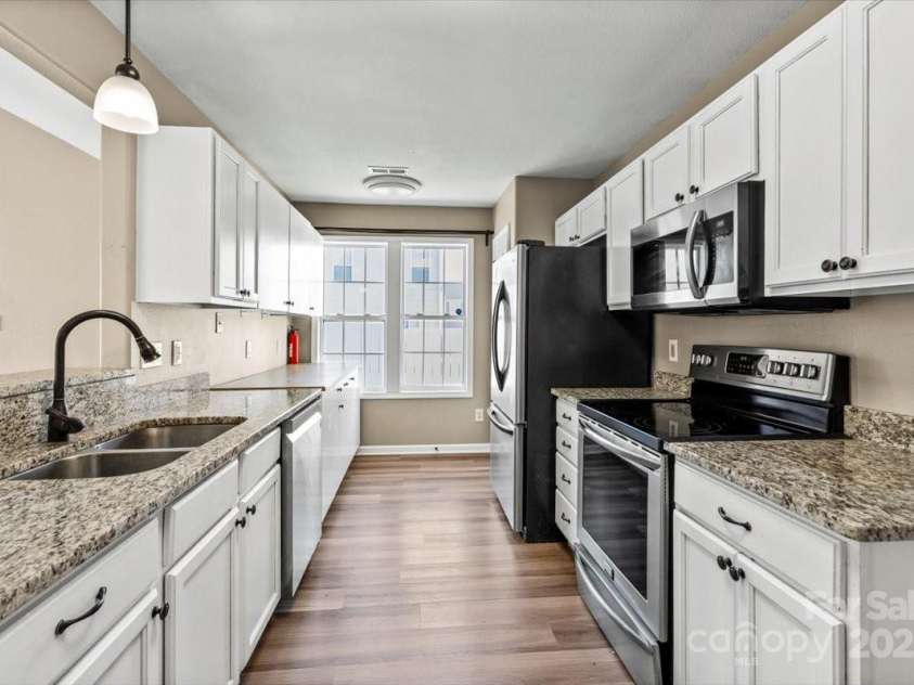 8610 Sawleaf Court, Charlotte, NC 28215.  MLS# CAR4257465, YatesRealty ID 20899. 