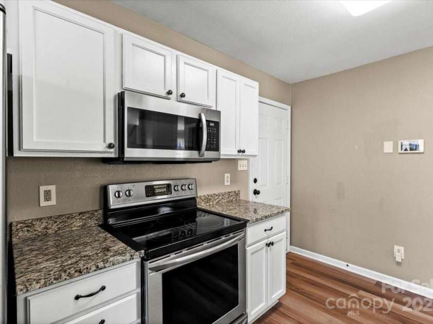 8610 Sawleaf Court, Charlotte, NC 28215.  MLS# CAR4257465, YatesRealty ID 20899. 