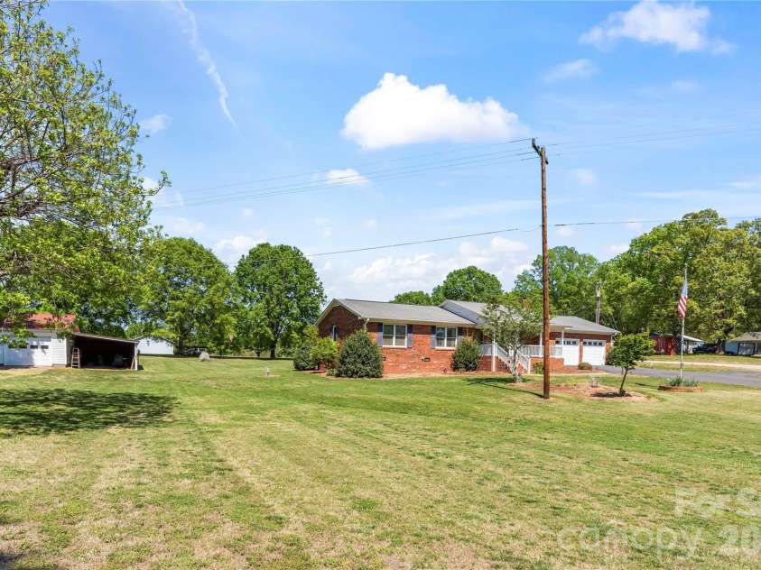 2503 White Store Road, Wingate, NC 28174.  MLS# CAR4368423, YatesRealty ID 20901. Beautiful, flat lot