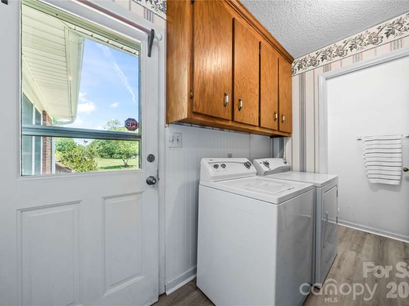 2503 White Store Road, Wingate, NC 28174.  MLS# CAR4368423, YatesRealty ID 20901. Laundry room with storage