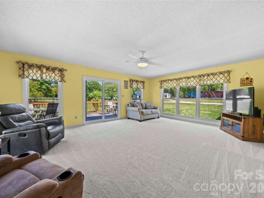 2503 White Store Road, Wingate, NC 28174.  MLS# CAR4368423, YatesRealty ID 20901. Light and bright sunroom