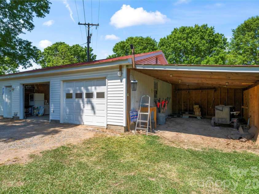 2503 White Store Road, Wingate, NC 28174.  MLS# CAR4368423, YatesRealty ID 20901. Second two car garage with to lean tos