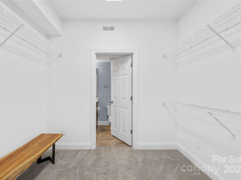 833 Lemond Lane, Denver, NC 28037.  MLS# CAR4269159, YatesRealty ID 20901. Walk-through closet entance from main house to apartment space