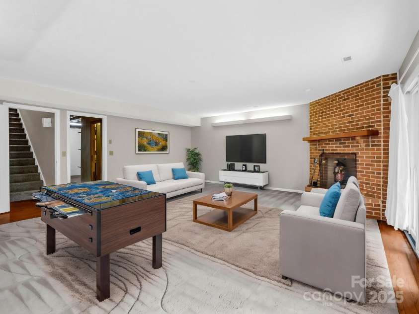 31 Hunting Country Trail, Tryon, NC 28782.  MLS# CAR4240091, YatesRealty ID 20903. Den in Basement Virtually Staged