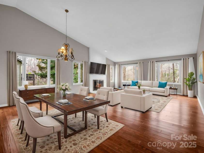 31 Hunting Country Trail, Tryon, NC 28782.  MLS# CAR4240091, YatesRealty ID 20903. Dining & LR Virtually Staged