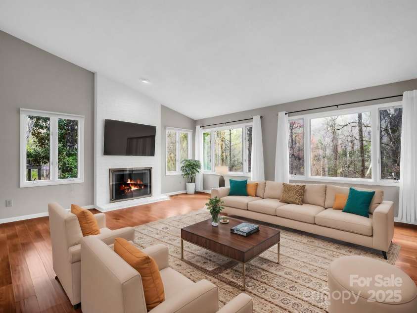 31 Hunting Country Trail, Tryon, NC 28782.  MLS# CAR4240091, YatesRealty ID 20903. Living Room Virtually Staged