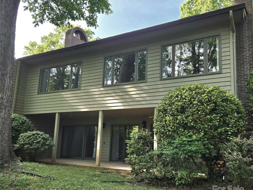 31 Hunting Country Trail, Tryon, NC 28782.  MLS# CAR4240091, YatesRealty ID 20903. Rear View of end unit.