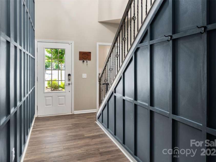 5014 Forest Hills Place, Fort Mill, SC 29707.  MLS# CAR4256572, YatesRealty ID 20906. Custom accent walls in two story foyer