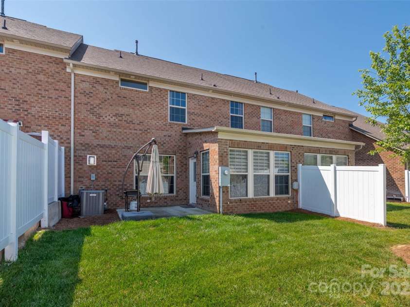5014 Forest Hills Place, Fort Mill, SC 29707.  MLS# CAR4256572, YatesRealty ID 20906. Private back patio