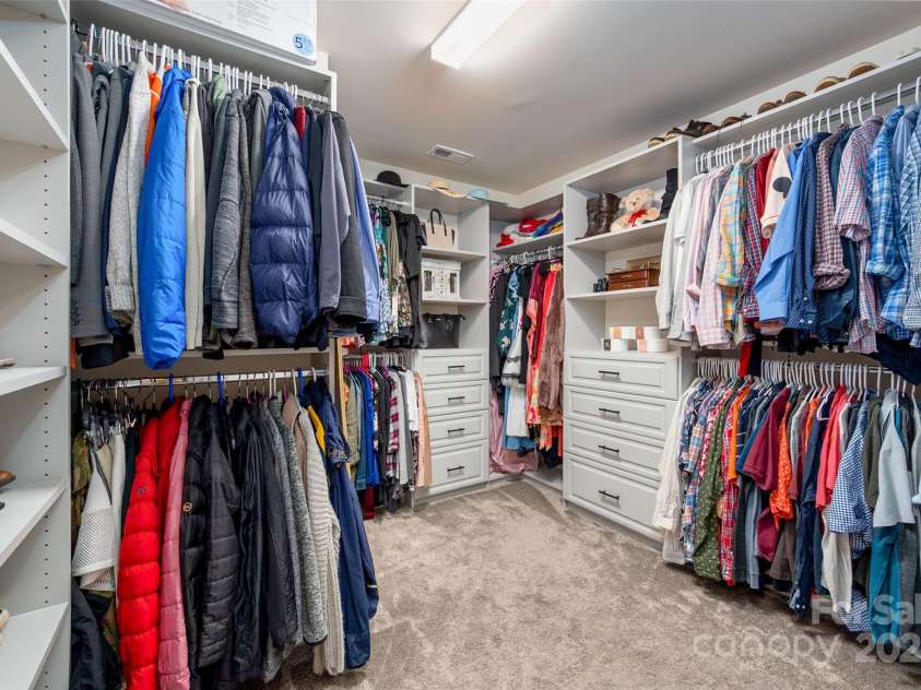 5014 Forest Hills Place, Fort Mill, SC 29707.  MLS# CAR4256572, YatesRealty ID 20906. Walk-in closet with custom built-ins
