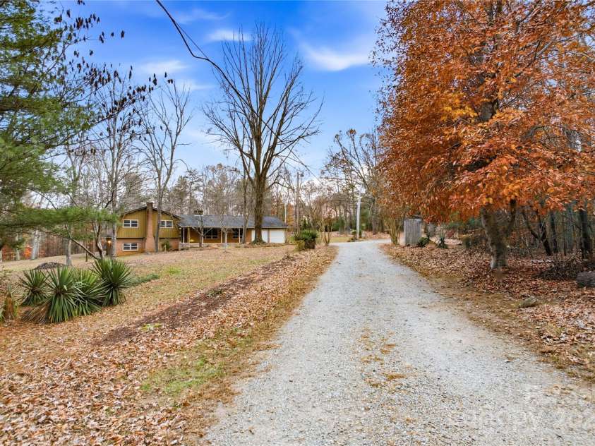 2619 Hopewell Church Road, Sherrills Ford, NC 28673.  MLS# CAR4265772, YatesRealty ID 2091. Gravel driveway provides a scenic and private entry to the property.