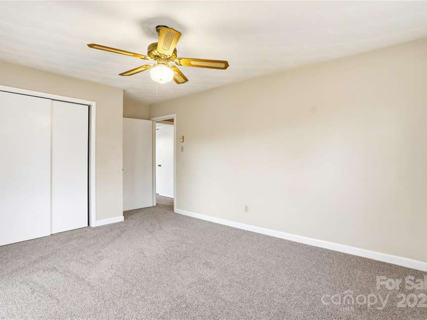 2619 Hopewell Church Road, Sherrills Ford, NC 28673.  MLS# CAR4265772, YatesRealty ID 2091. Secondary bedroom opens to the deck, perfect for stepping out to enjoy peaceful surroundings.