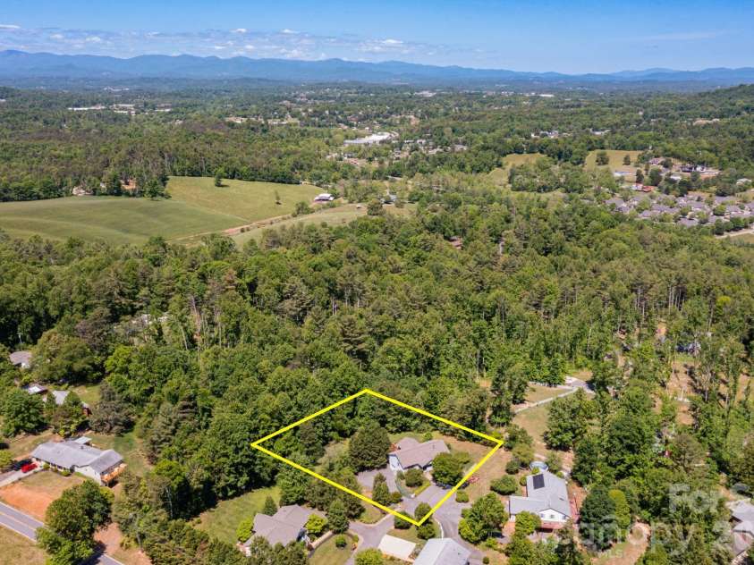 6 Arrowhead Lane, Weaverville, NC 28787.  MLS# CAR4363937, YatesRealty ID 20910. Aerial Image - Approximate Property Lines