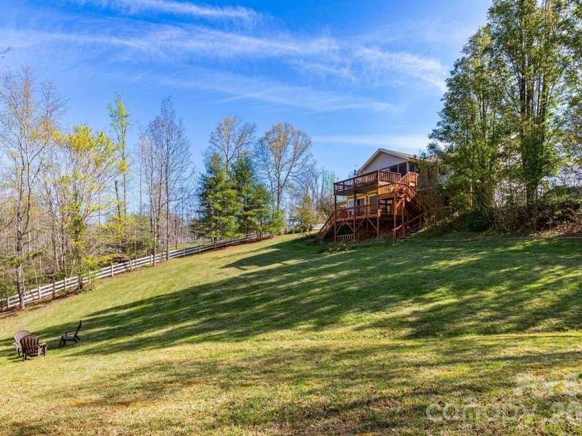 6 Arrowhead Lane, Weaverville, NC 28787.  MLS# CAR4363937, YatesRealty ID 20910. Back Yard