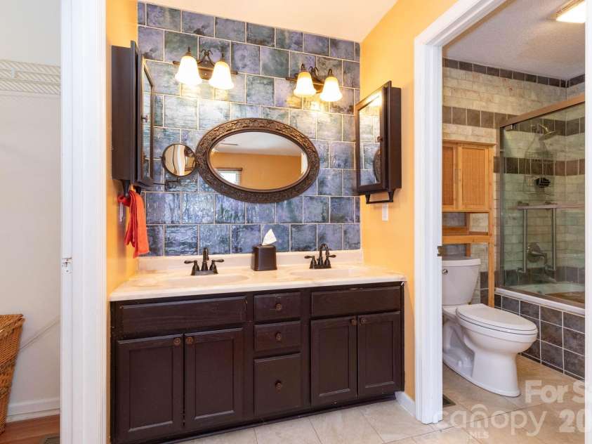 6 Arrowhead Lane, Weaverville, NC 28787.  MLS# CAR4363937, YatesRealty ID 20910. Primary Bathroom