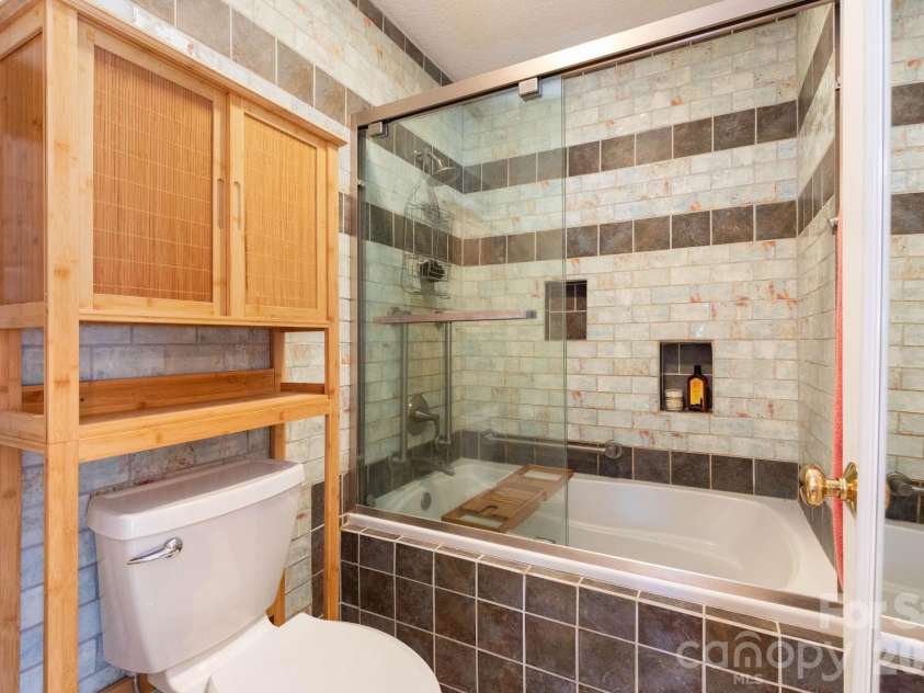 6 Arrowhead Lane, Weaverville, NC 28787.  MLS# CAR4363937, YatesRealty ID 20910. Primary Bathroom