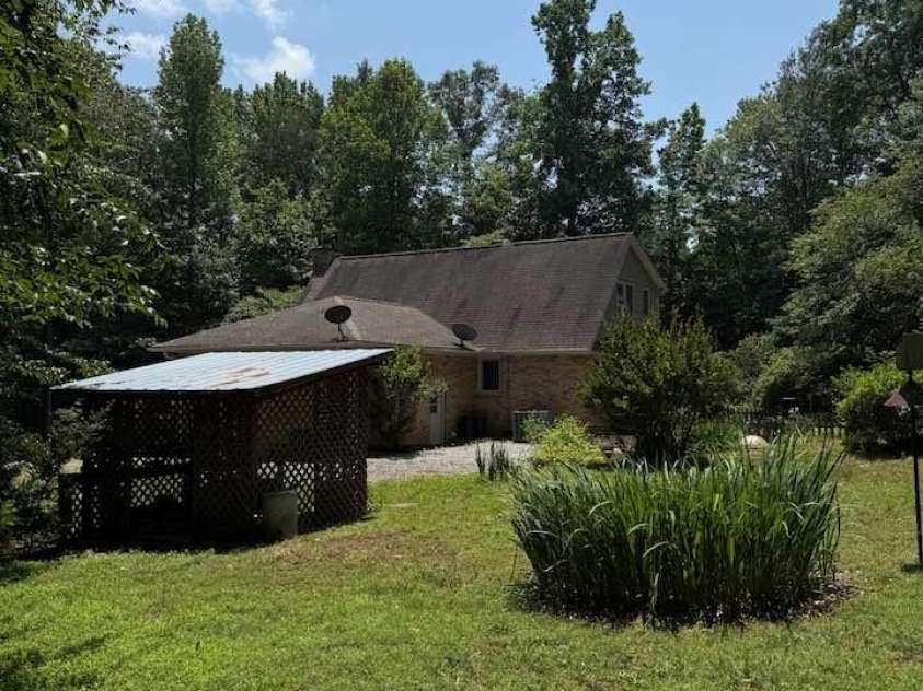 266 Case Street, Columbus, NC 28722.  MLS# CAR4265986, YatesRealty ID 20911. Large, private back yard!