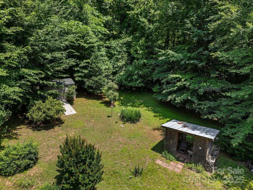 266 Case Street, Columbus, NC 28722.  MLS# CAR4265986, YatesRealty ID 20911. Potting shed and storage unit in large back yard.