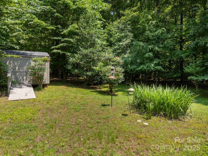 266 Case Street, Columbus, NC 28722.  MLS# CAR4265986, YatesRealty ID 20911. Storage unit, and space for garden or recreation!