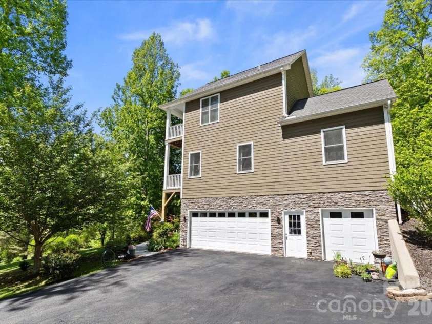 1307 Golf Course Road, Old Fort, NC 28762.  MLS# CAR4372492, YatesRealty ID 20912. 2 car garage w/second door for mower etc.