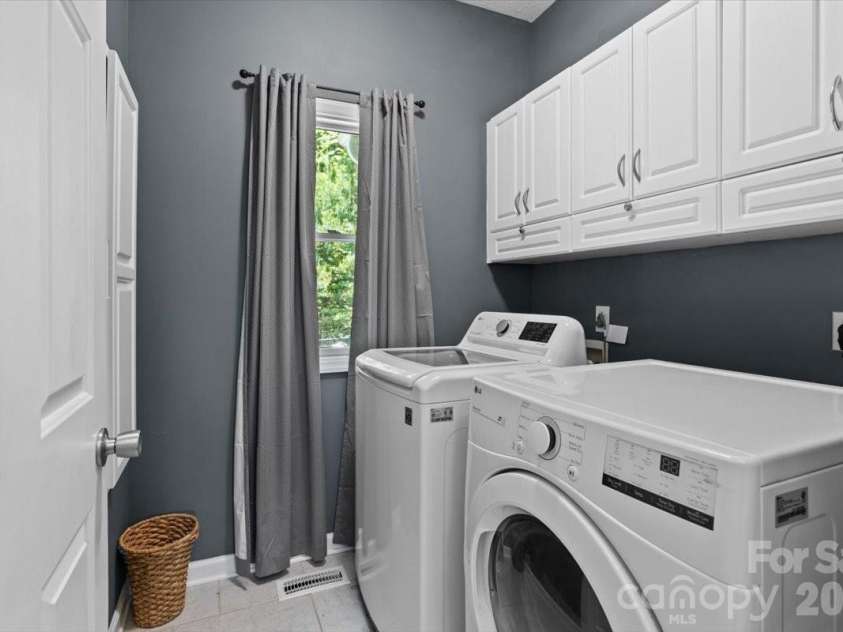 1307 Golf Course Road, Old Fort, NC 28762.  MLS# CAR4372492, YatesRealty ID 20912. Laundry room just off kitchen