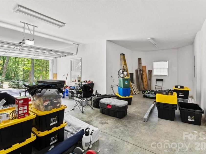 1307 Golf Course Road, Old Fort, NC 28762.  MLS# CAR4372492, YatesRealty ID 20912. Spacious garage with extra space
