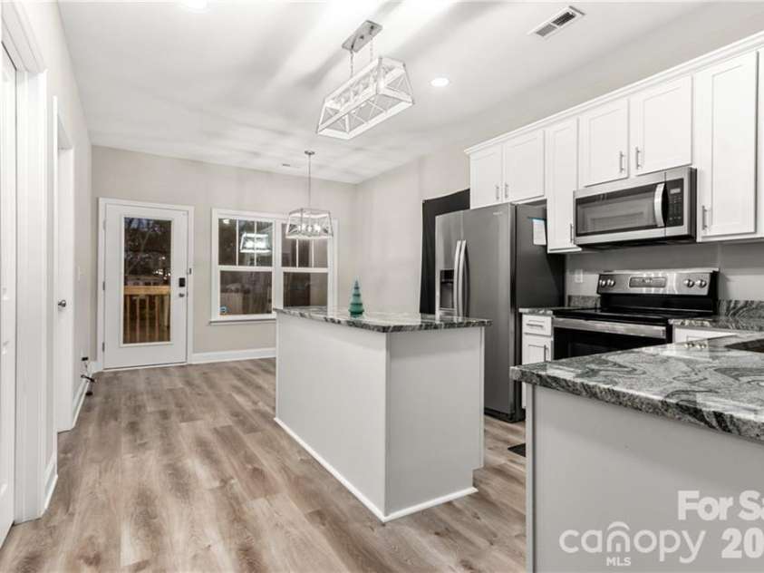 231 Barber Street, Rock Hill, SC 29730.  MLS# CAR4341578, YatesRealty ID 2092. Kitchen and dining room